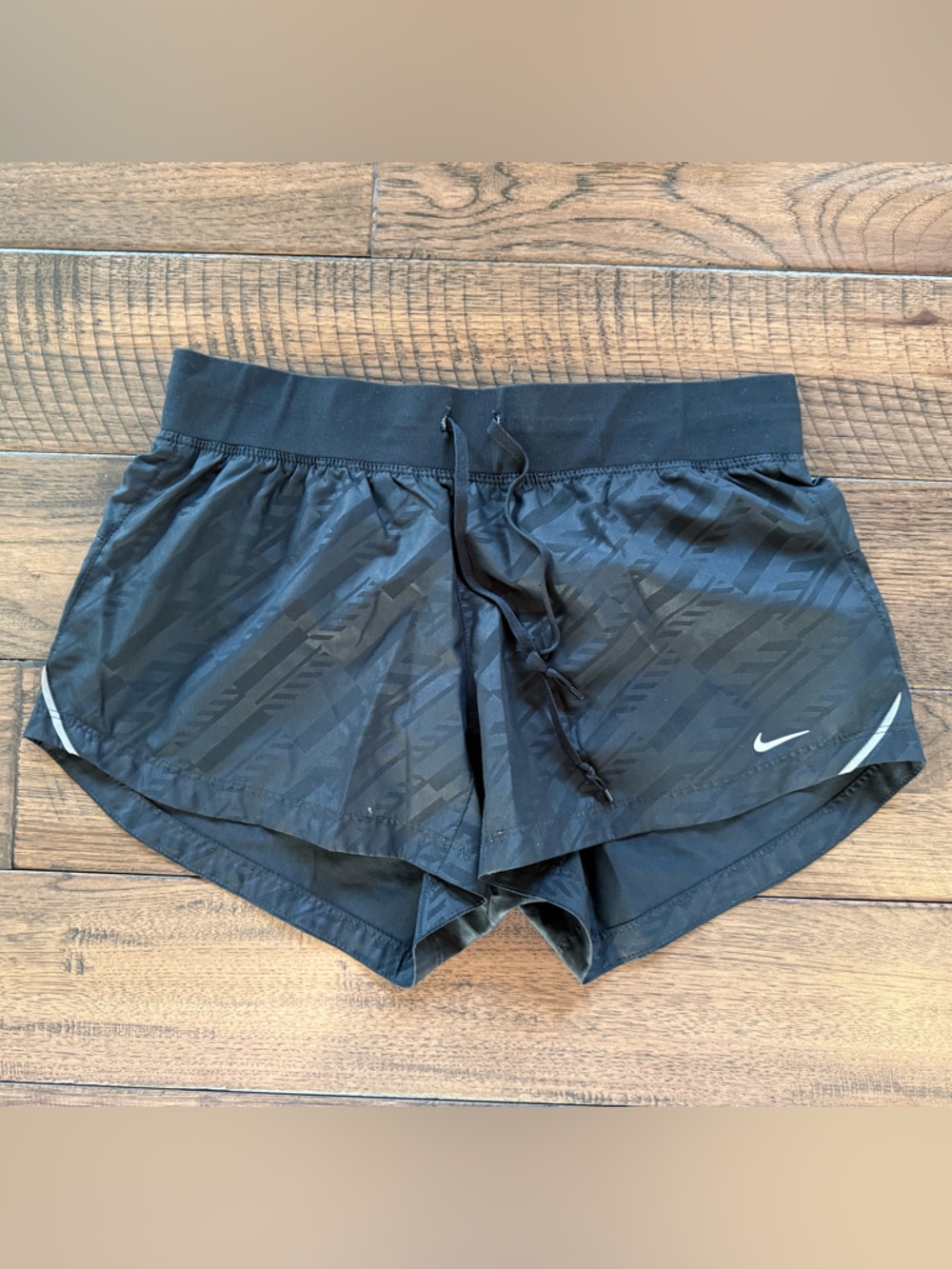 Nike Women’s Black Athletic Shorts with Subtle Black Pattern, Medium